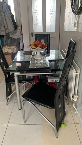 Glass extending table and four - extending,